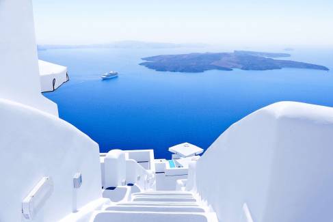 White staircases and Mediterranean sea viw on Santorini, Greece