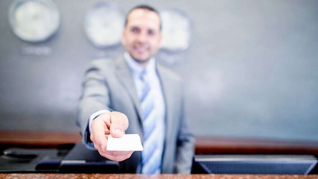 A business man with card