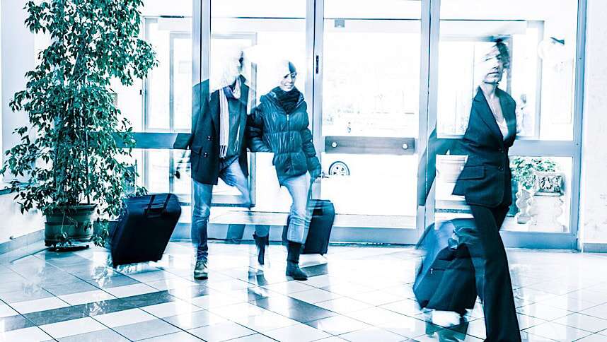 Business peoples walking with trolly