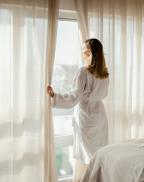 Women standing near the window