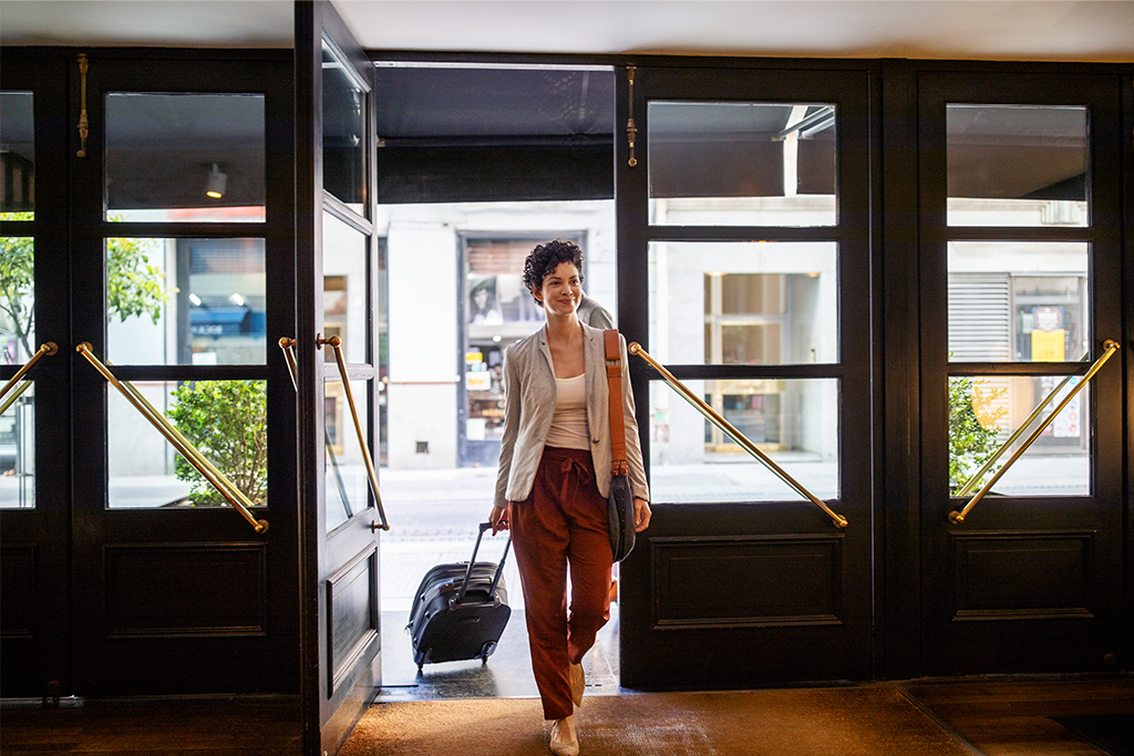 Business Woman entering Hotel