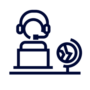 Person wearing headset sitting at desk with a globe nearby, representing customer support.