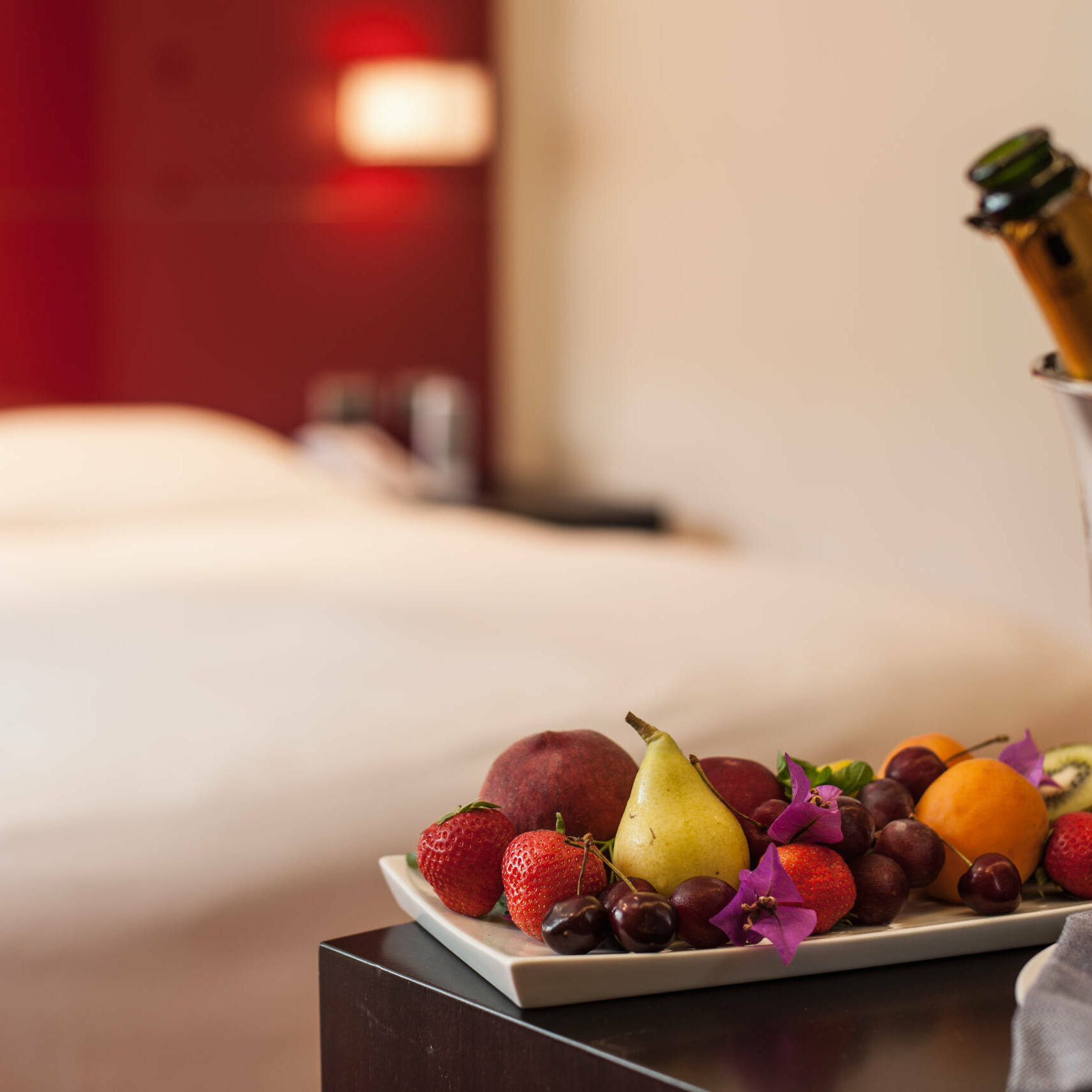 Fruit plate and champagne in hotel room personalized service hotel service optimization